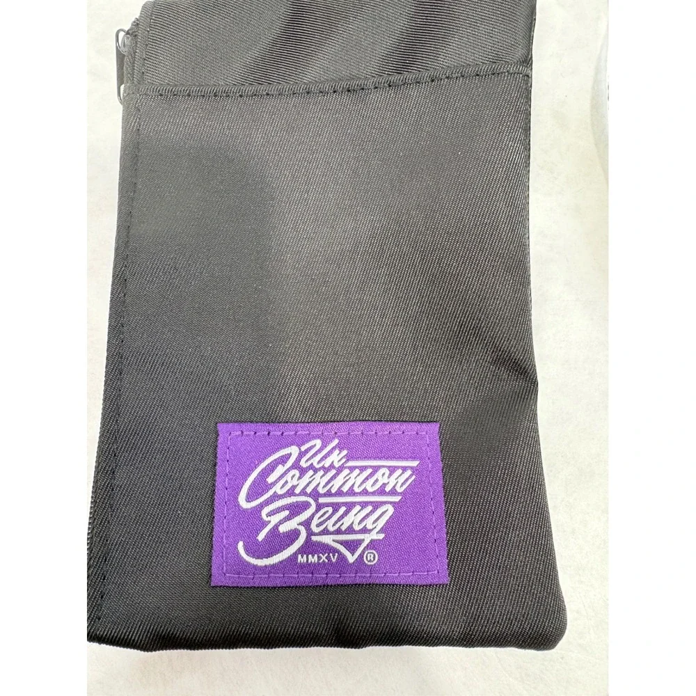 Uncommon Being Black Nylon Crossbody Neck Pouch‎ Utility Bag Purple Logo Patch